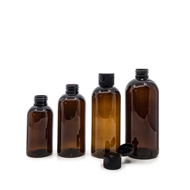 Borostyánszínű műanyag flakon, fekete flip-top kupak, 100 ml