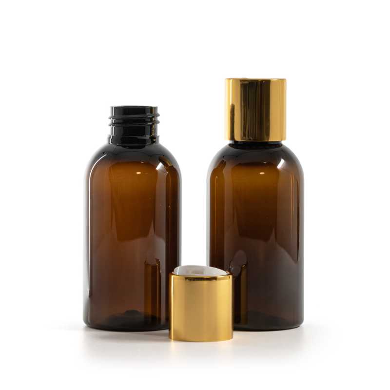 Barna műanyag palack, arany színű disc-top kupak fehér betéttel, 100 ml