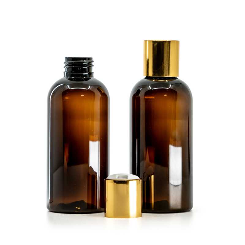 Barna műanyag palack, arany színű disc-top kupak, fehér betéttel, 150 ml