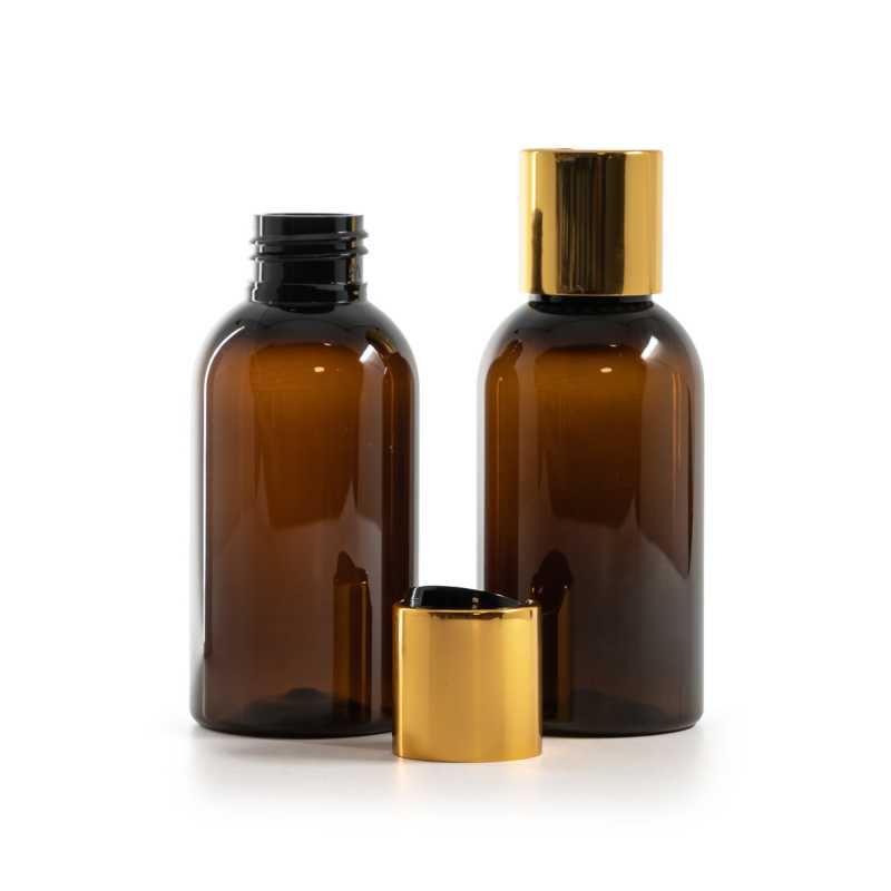 Barna műanyag palack fekete disc-top kupakkal, arany alumíniumgyűrűvel, 100 ml