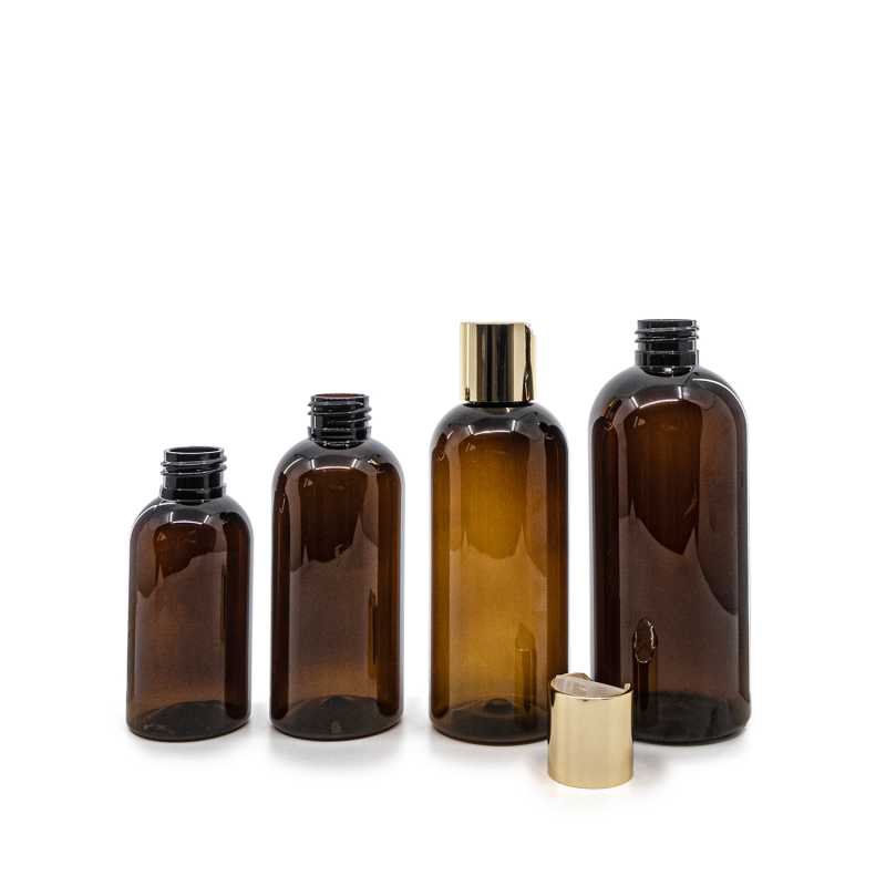 Borostyánszínű műanyag palack arany disc top kupakkal, 200 ml