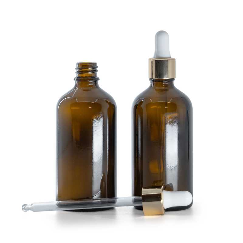 Borostyánszínű üvegpalack fehér-arany pipettával, 100 ml