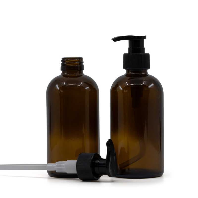 Borostyánsárga Boston üvegpalack 28 mm fekete bordázott adagolóval 250 ml