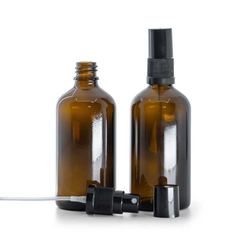 Borostyánszínű üvegpalack, fekete permetezőfej, fekete kupak, 100 ml