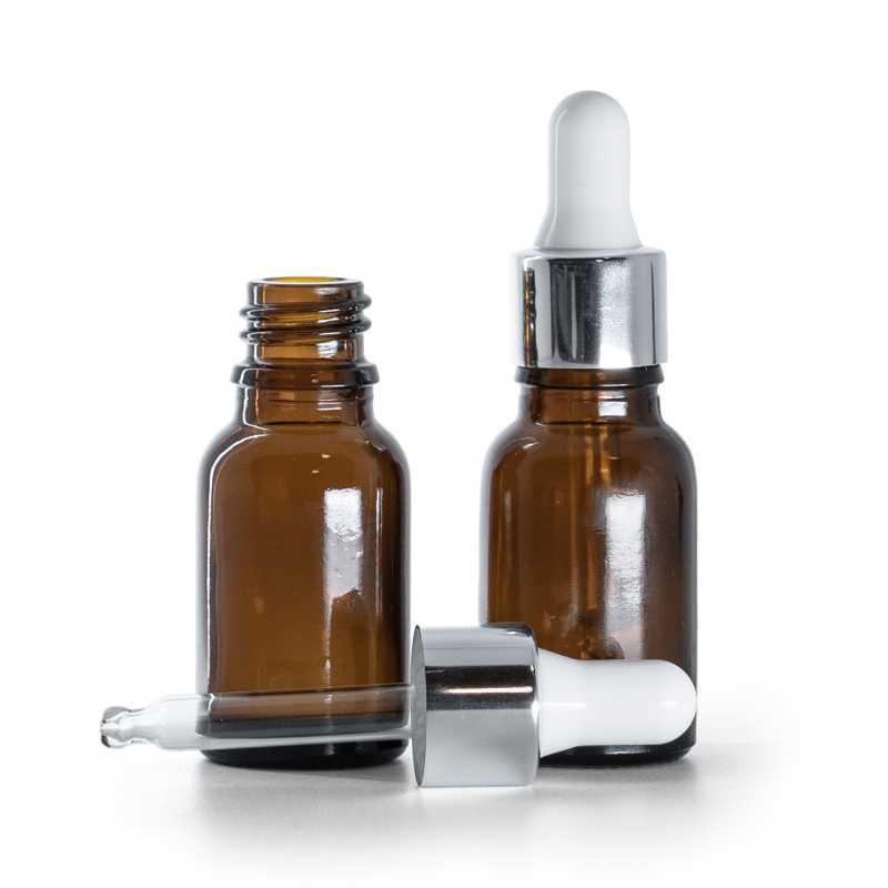 Borostyánszínű üvegpalack fényes ezüst pipettával 15 ml