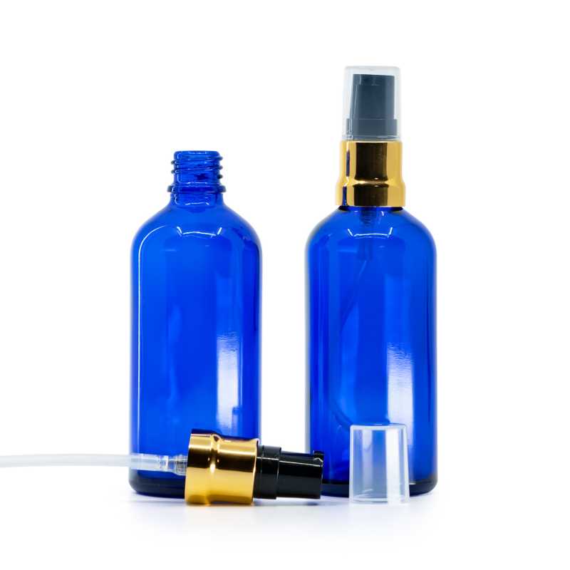 Kék üvegpalack, fényes fekete aranyszegélyes adagoló átlátszó kupakkal, 100 ml