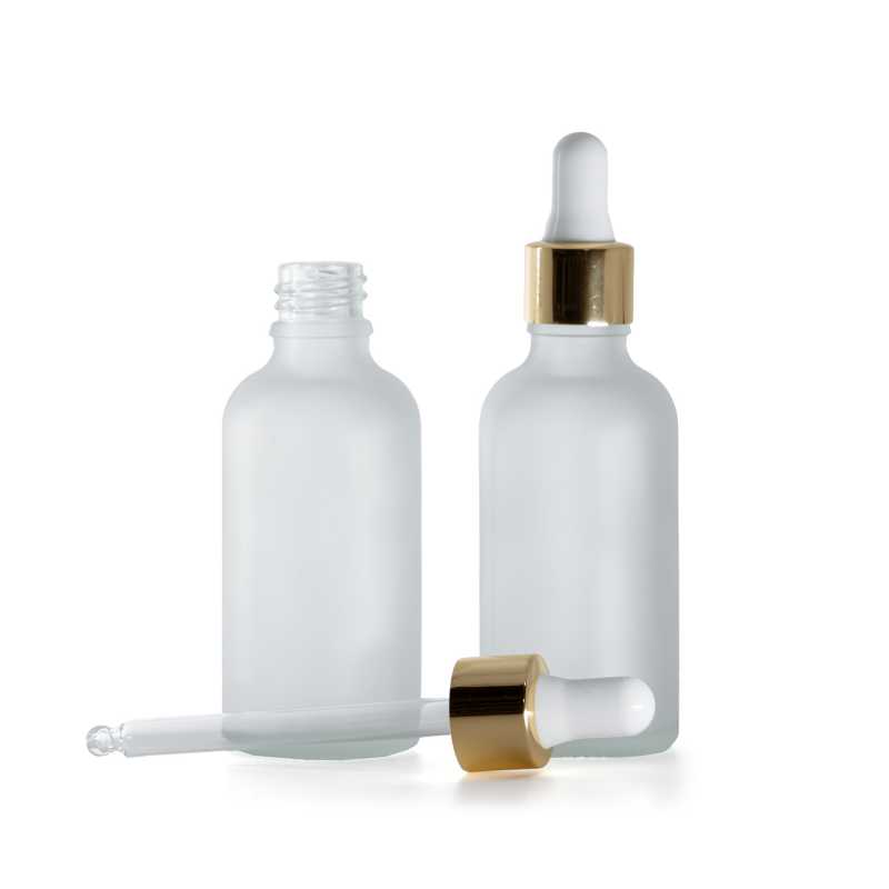Átlátszó, matt üvegpalack, fehér-arany pipetta, 50 ml