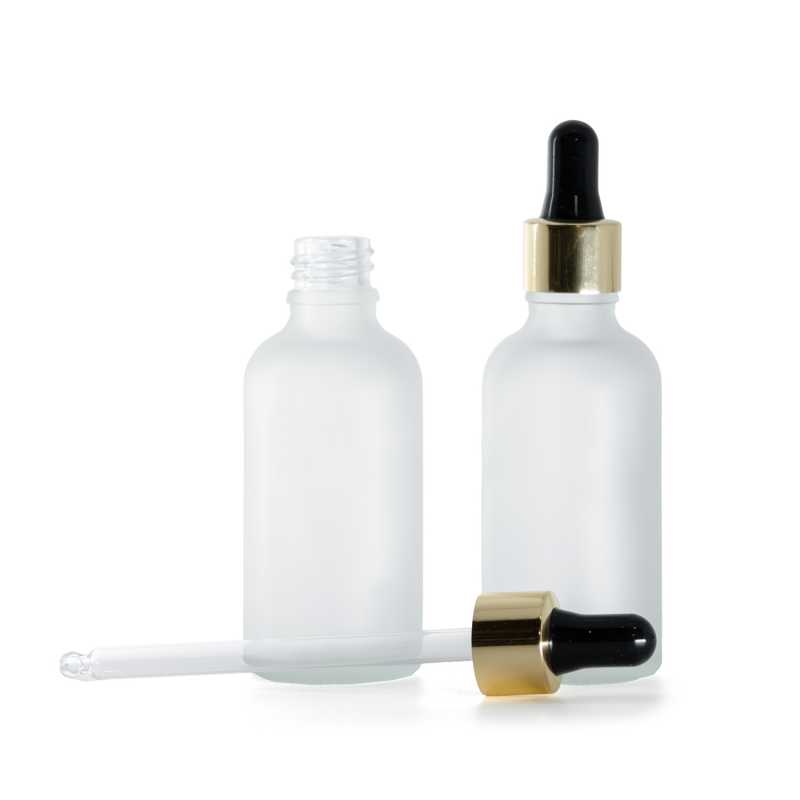 Átlátszó matt üvegpalack fekete-arany pipettával, 50 ml