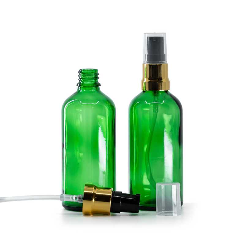 Zöld üvegpalack, fényes fekete adagoló arany díszítéssel és átlátszó kupakkal, 100 ml