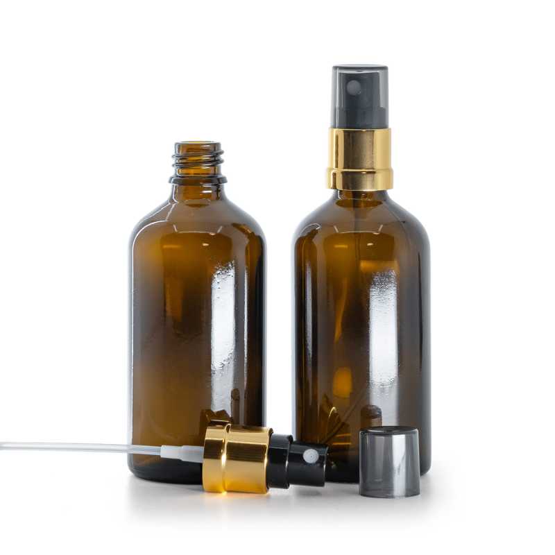 Borostyánszínű üvegpalack, fekete-arany permetezőfej, Smokey kupak, 100 ml