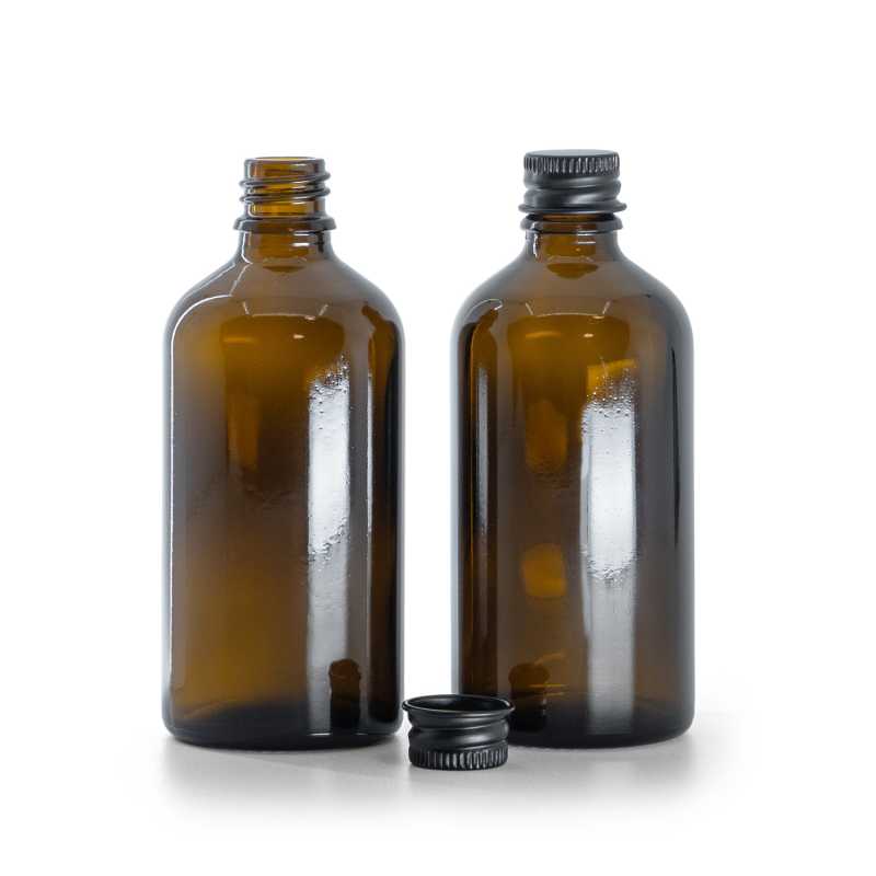 Borostyánsárga üvegpalack, fekete alumínium kupak, 100 ml