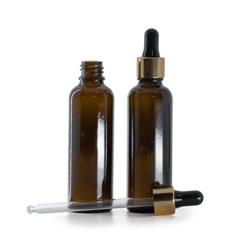 Karcsú borostyánszínű üvegpalack fekete-arany pipettával 50 ml