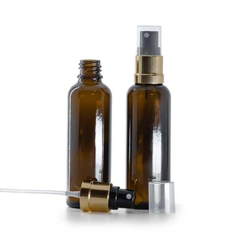 Karcsú borostyánszínű üvegpalack fekete-arany permetezőfejjel 50 ml